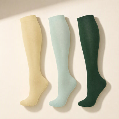 Mid-calf sports compression socks with a polka-dot pattern - view 3