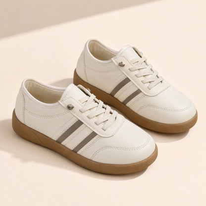 Women's low-top sports shoes with front ties and a round toe