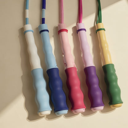 Plastic skipping rope with soft beads arranged in bamboo-style sections - view 3