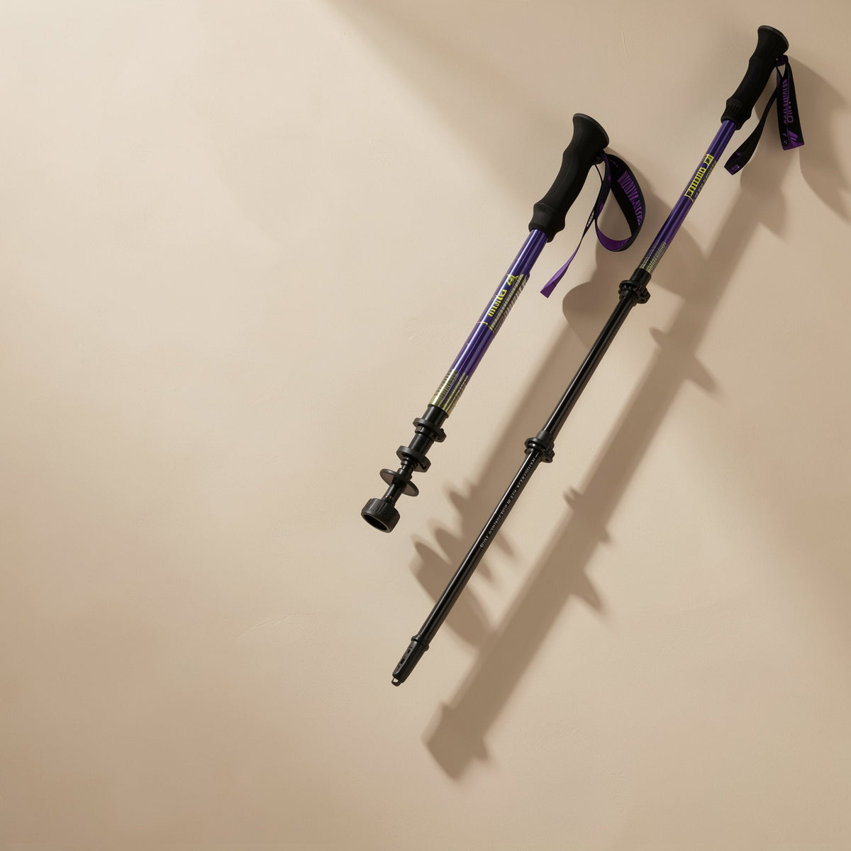 Carbon fiber trekking pole with three sections, an external lock, and a tungsten steel tip