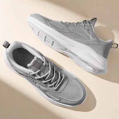 Adult unisex running shoe with a PU-and-mesh upper and low-top profile - view 3